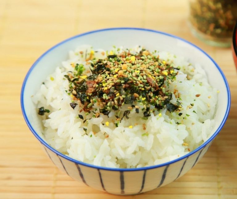 A bowl of rice topped with furikake seasoning